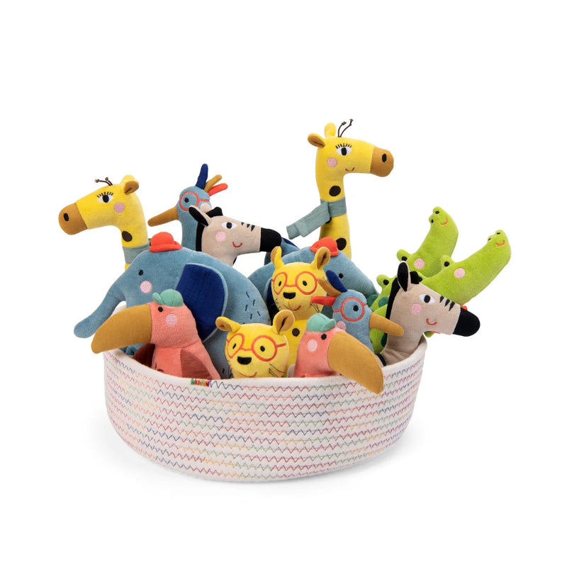 Basket filled with colorful plush toys on a white background