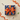 Gift box wrapped in space-themed paper with orange ribbon bow